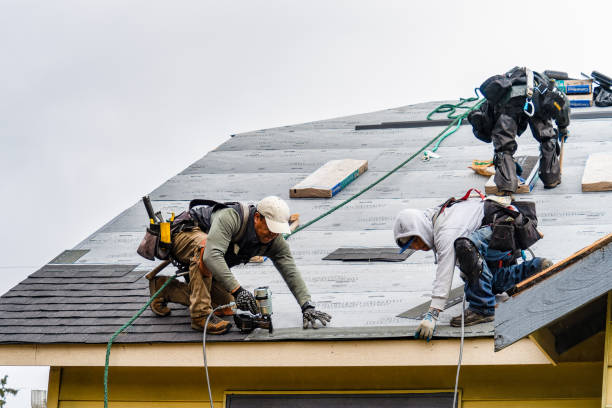 Professional Roof Installation technician working in Medford, MA
